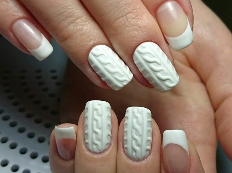 White knitted manicure with a jacket