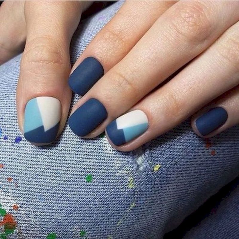 Geometric patterns on the nails.