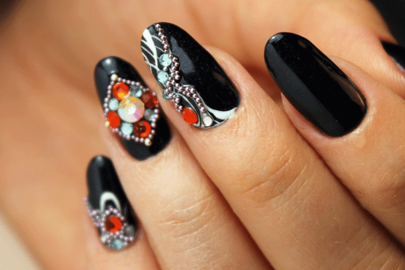 Chic manicure with pixie crystals and rhinestones