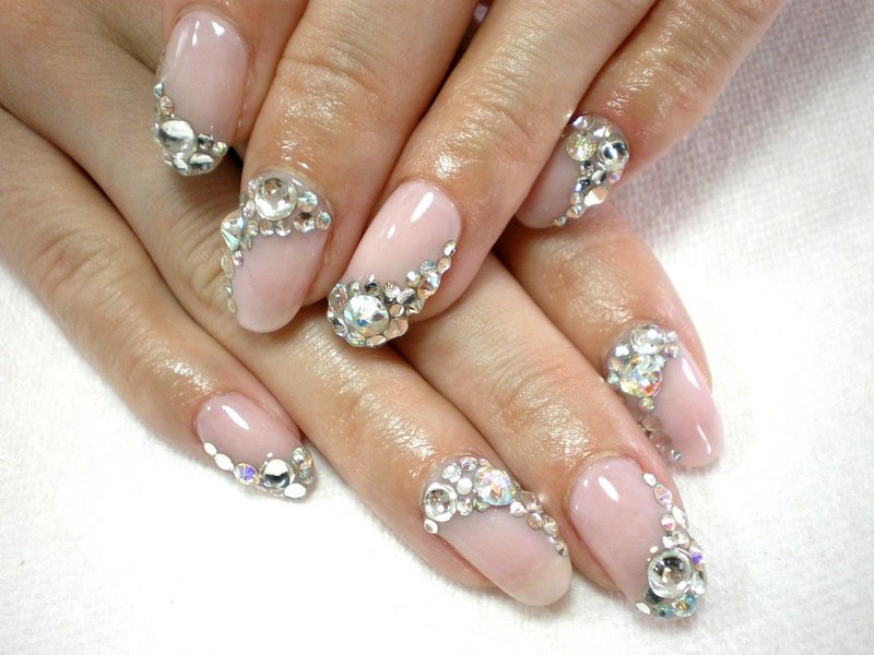 Flesh-colored manicure with rhinestones