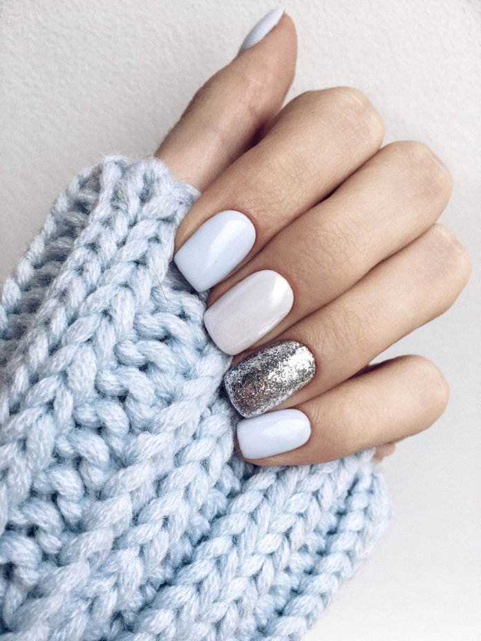 White manicure with sparkles