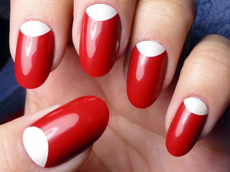 Unusual wedding red manicure with beige holes