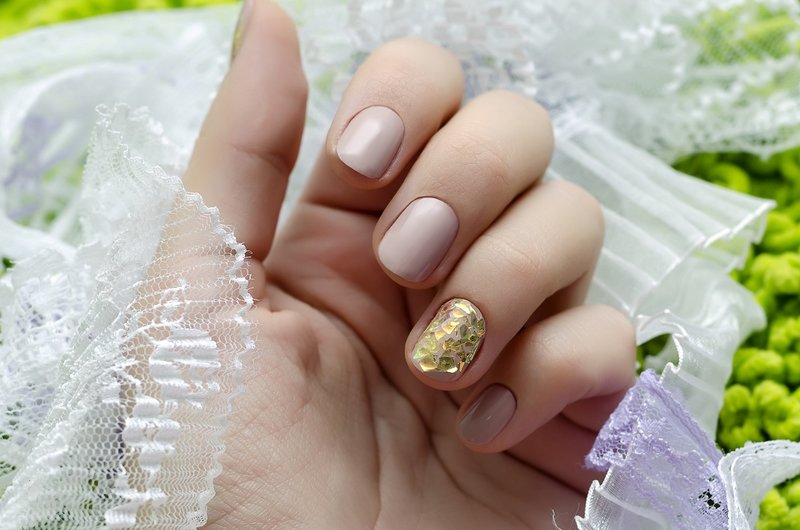 Wedding manicure nude with gold mica