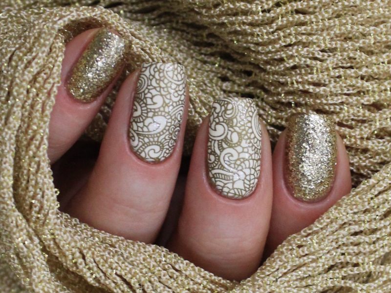 Unusual design with glitter and gold lace.