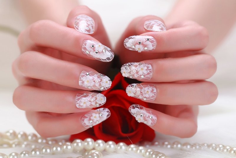 Wedding manicure with lace and acrylic flowers