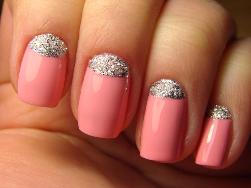 Bright pink silver glitter hole manicure