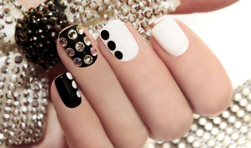 Black and white manicure with rhinestones