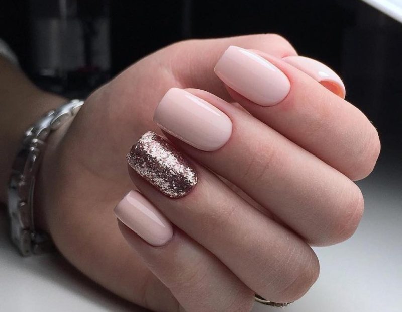 Pink nude manicure with glitter gel