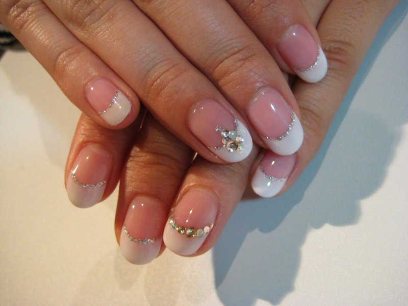 Delicate French manicure with rhinestone and broth edging