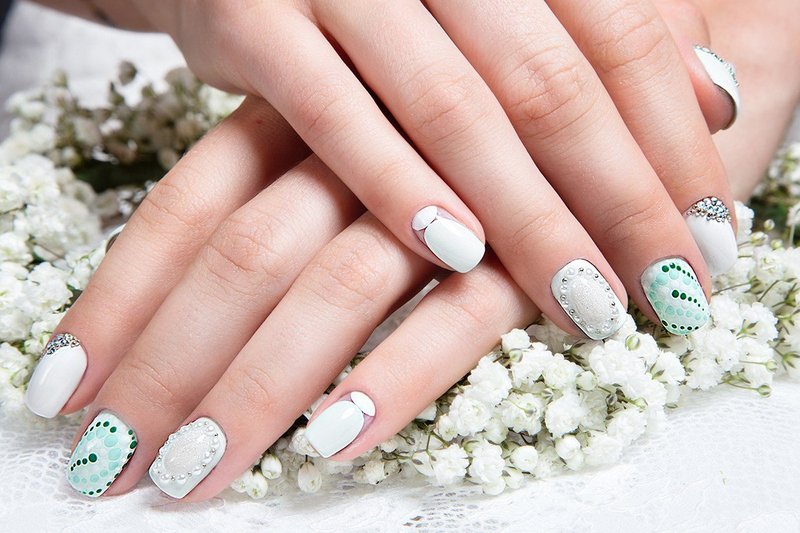 White with turquoise nails with rhinestones and silver