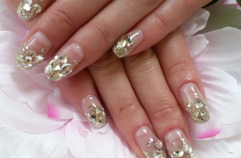 Unusual manicure with mica and golden rhinestones