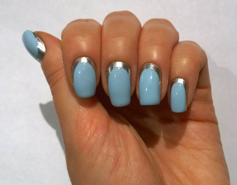 Baby blue manicure with silver trim