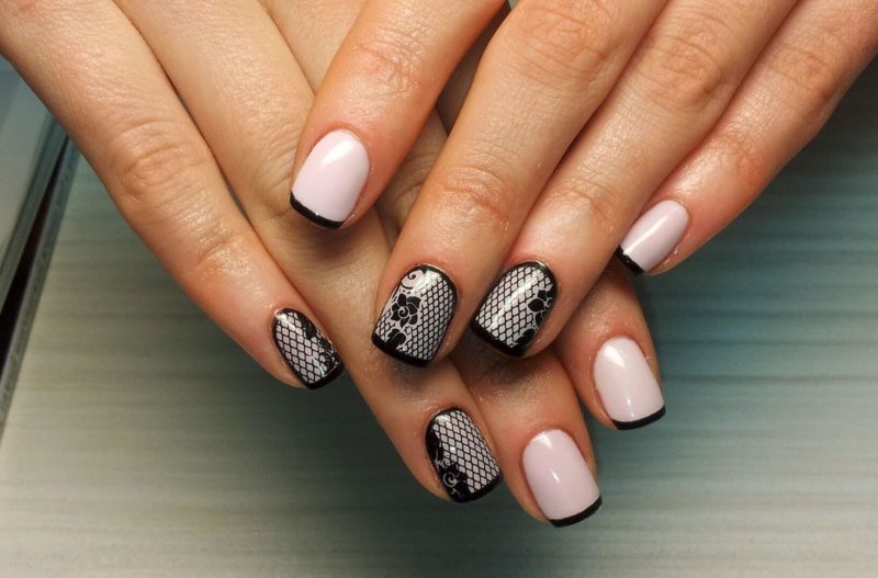 Pink nails with black french and patterns