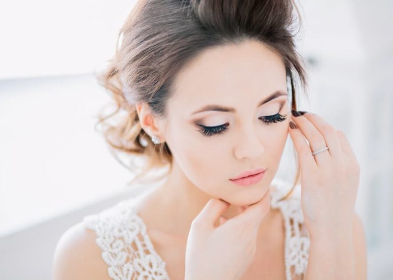 Gentle makeup with arrows for a wedding for green eyes