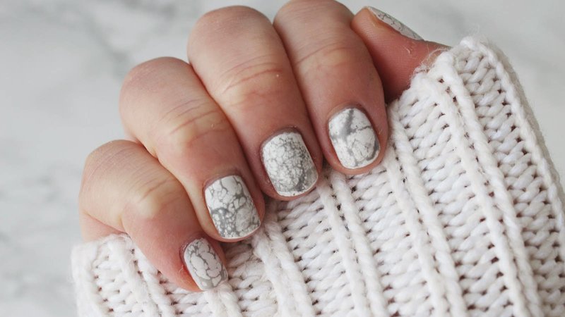 White nails with gray stains