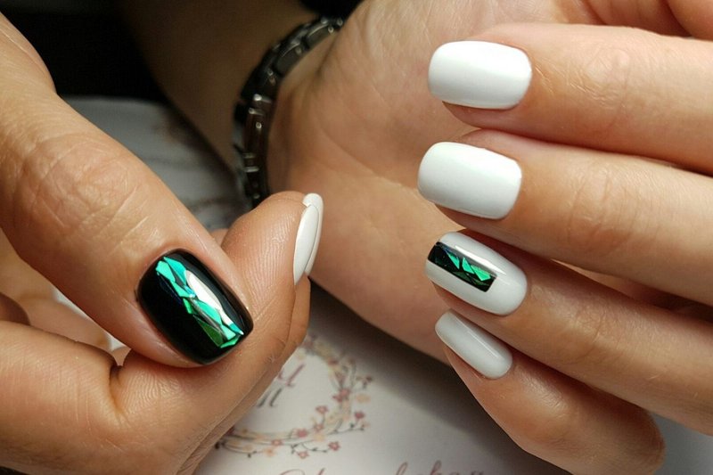 White manicure with broken glass inserts