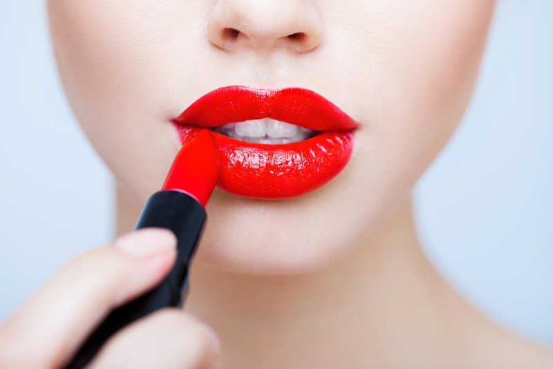 Bright scarlet lipstick