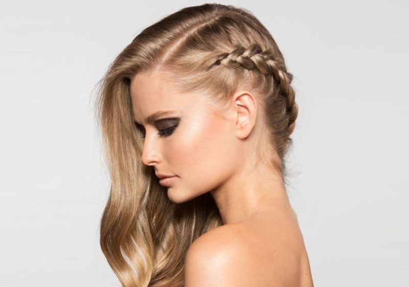 Asymmetric hairstyle with a braid for the new year