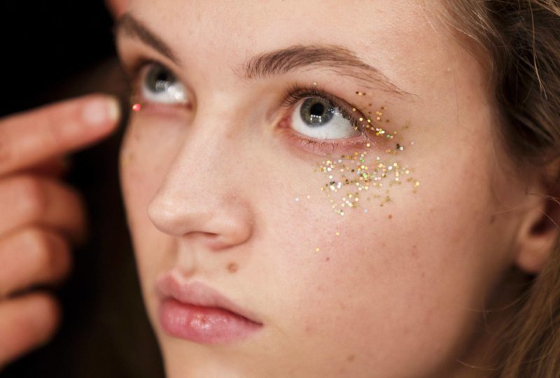 Gold glitter face makeup