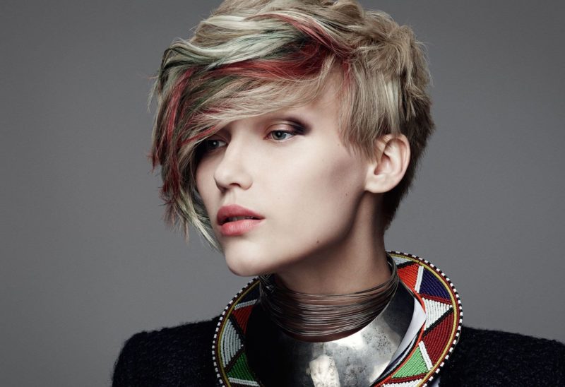 Bright hairstyle for short hair with colored strands