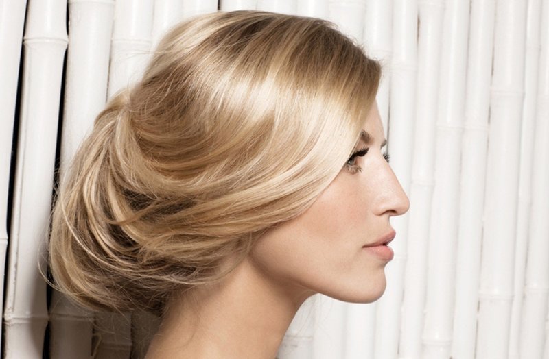 Beautiful hairstyle from collected hair with flowing lines