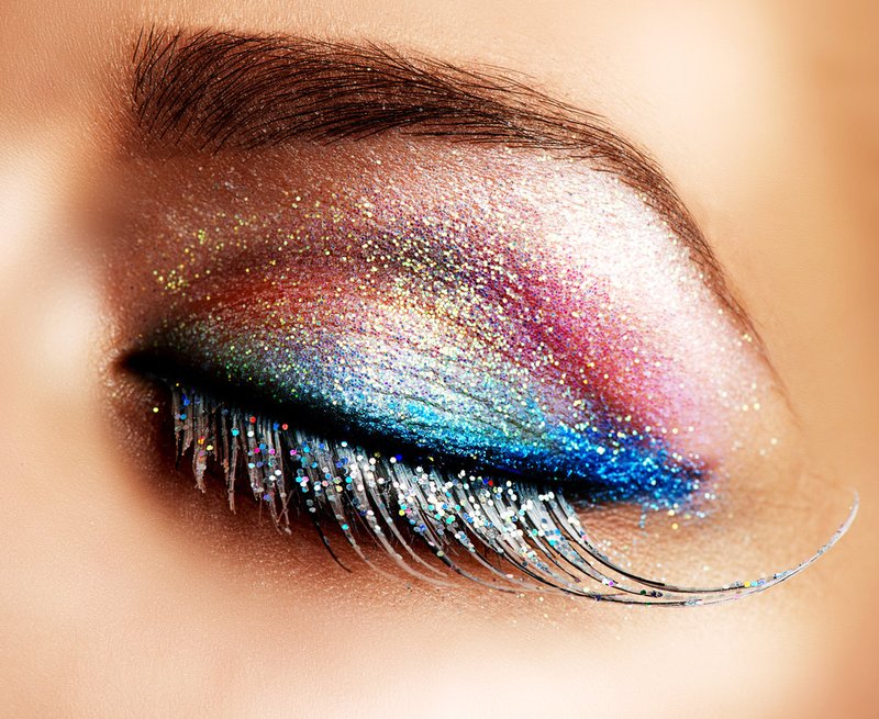 Multicolored make-up with glitter for the new year.