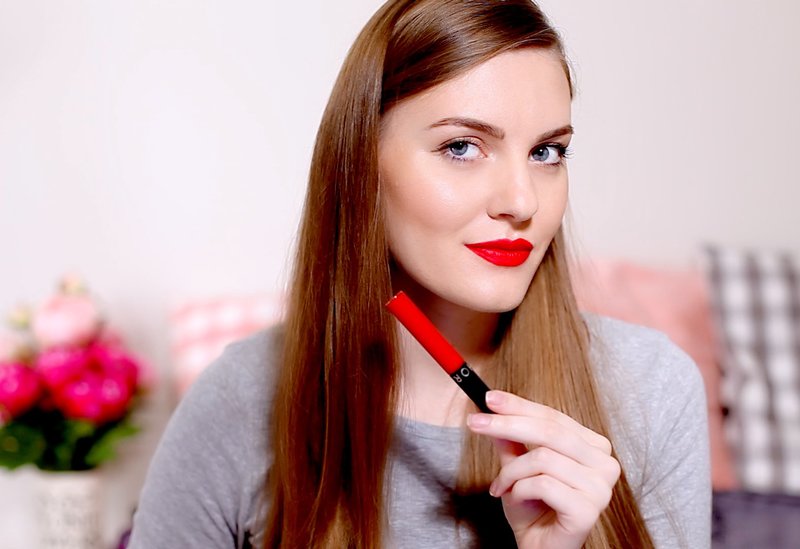 Delicate day makeup with rich red lipstick