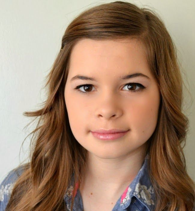 Makeup for a teenager using white eyeshadow and shine