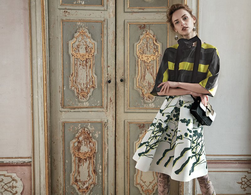 Light floral print skirt and dark striped blouse