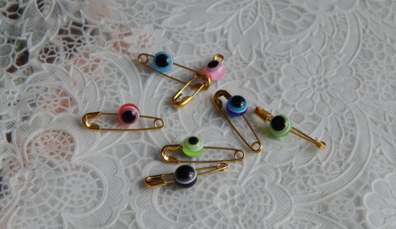 Amulet pins