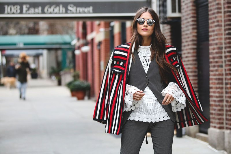 Two-piece suit with a light blouse and a blazer