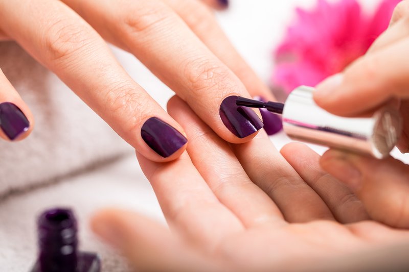 Manicure with violet gel polish