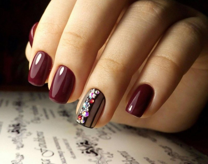 Glossy manicure with rhinestones