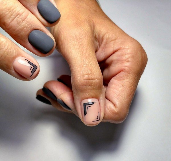 Matte manicure with a combination of geometric patterns and glitter