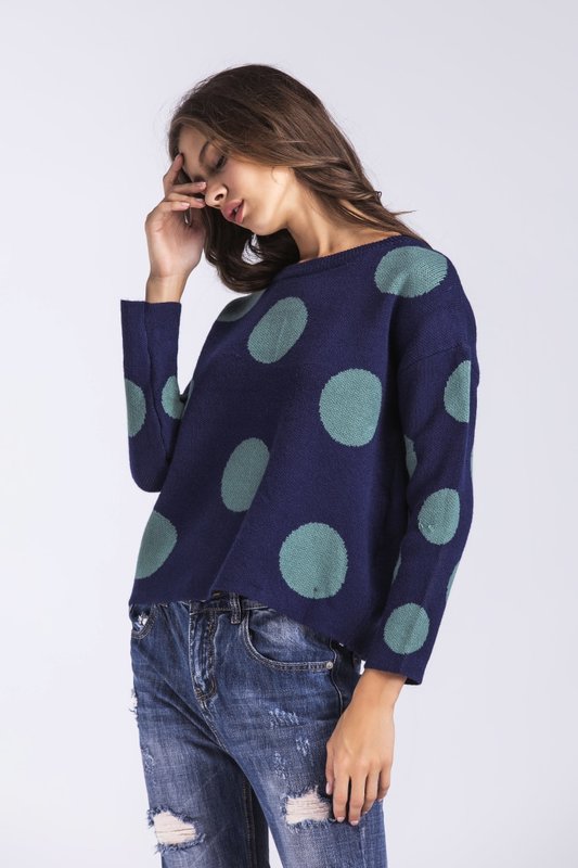 Girl in a crop sweater in large peas