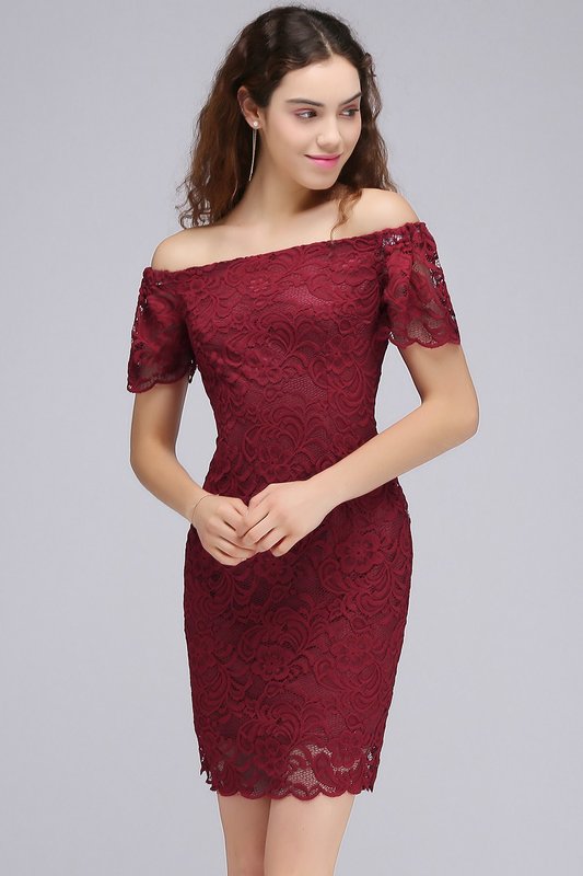 Girl in burgundy lace cocktail dress with bare shoulders