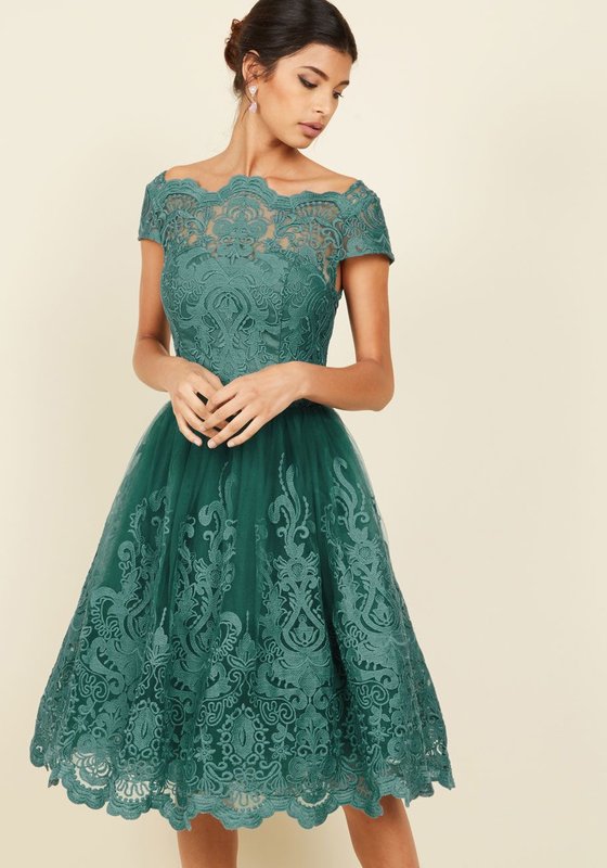 Girl in a lace cocktail dress