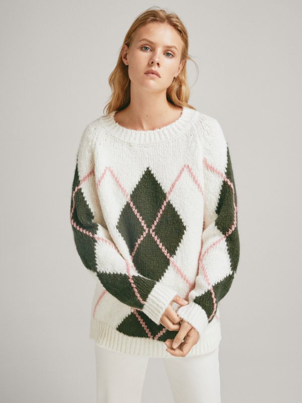 Girl in a sweater with a diamond pattern