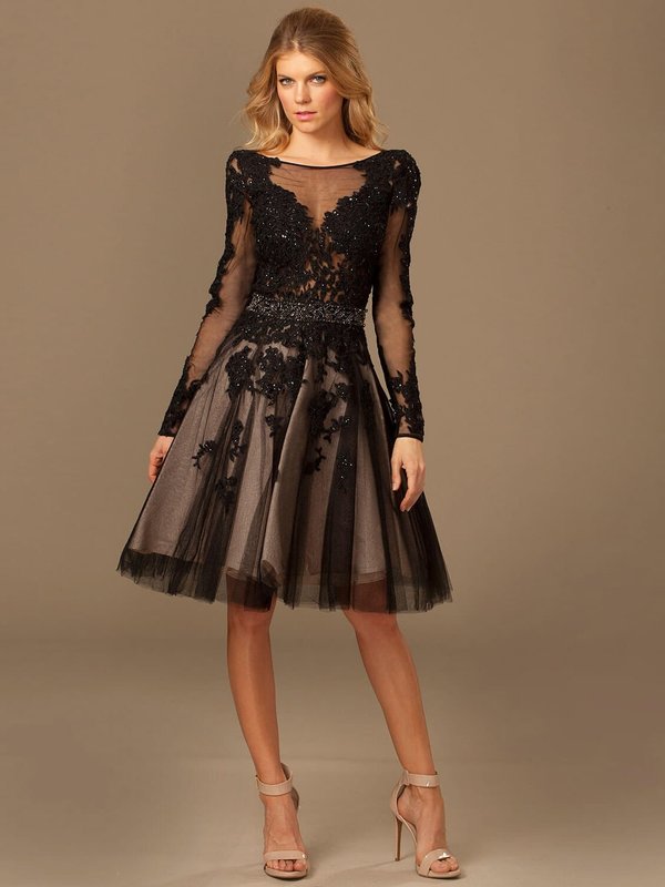 Girl in a black cocktail dress with lace