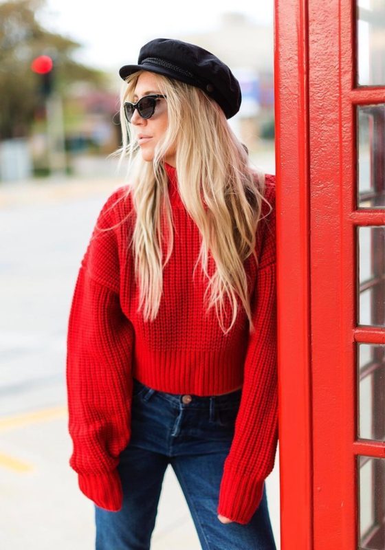 Girl in a red oversized sweater