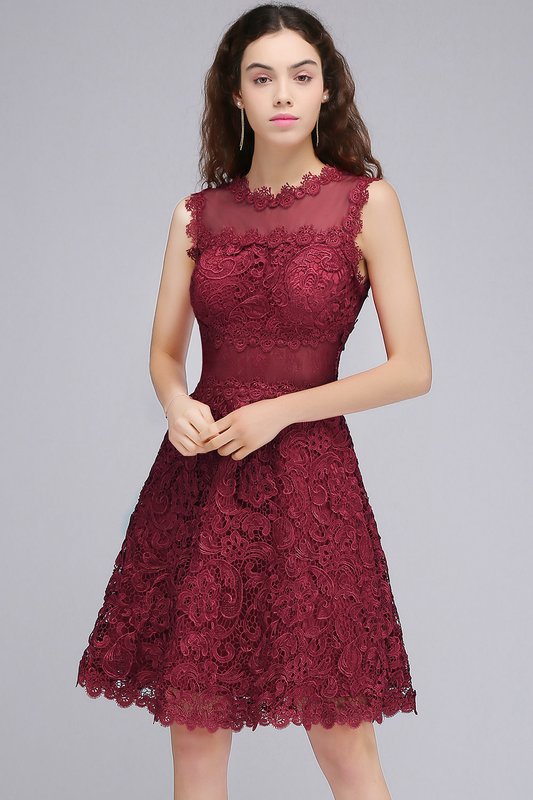 Girl in a burgundy cocktail dress with lace