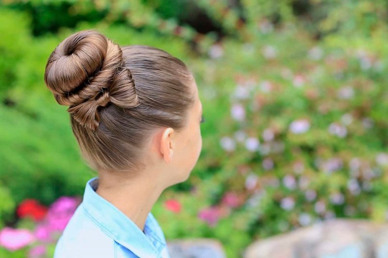 Girl with a hairstyle on long hair