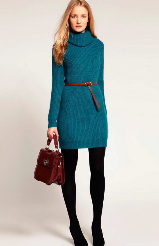 Girl in a sweater dress with a thin belt