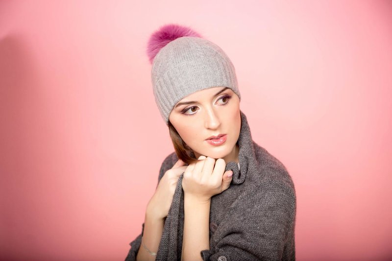 Gray hat with pink pompom