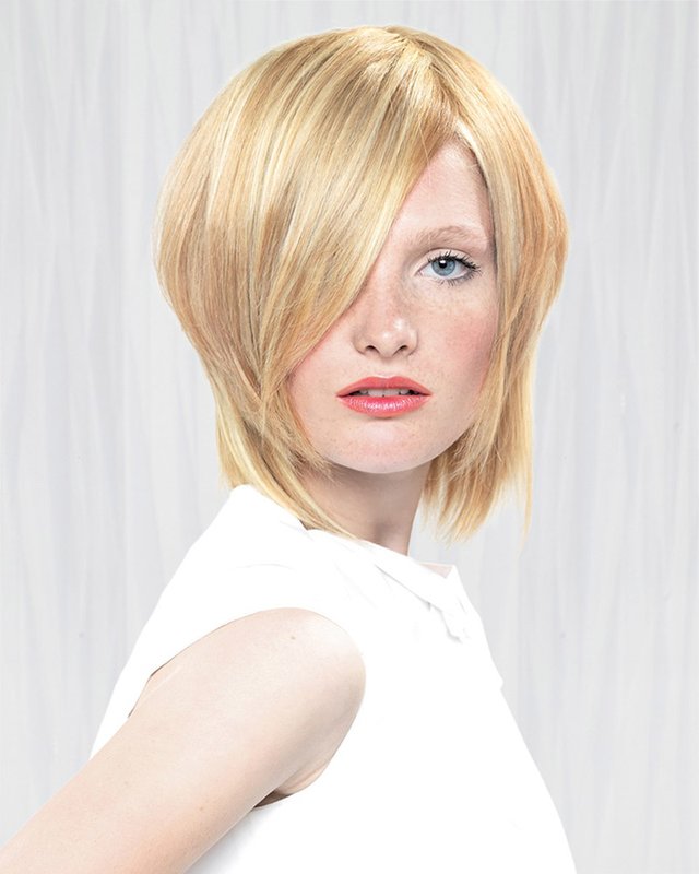 Girl with a bob haircut and a long oblique bang