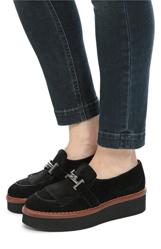 Girl in platform loafers