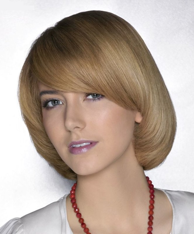 Page haircut with extended oblique bangs