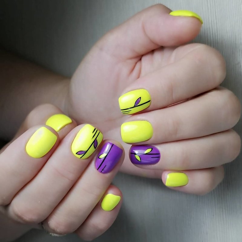 Yellow and purple manicure.