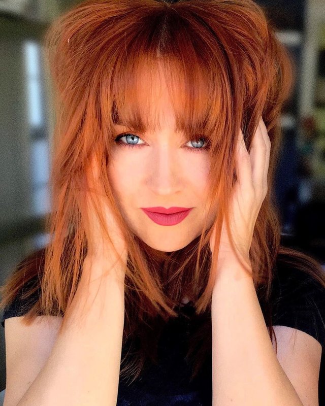 Extra long bangs and red hair