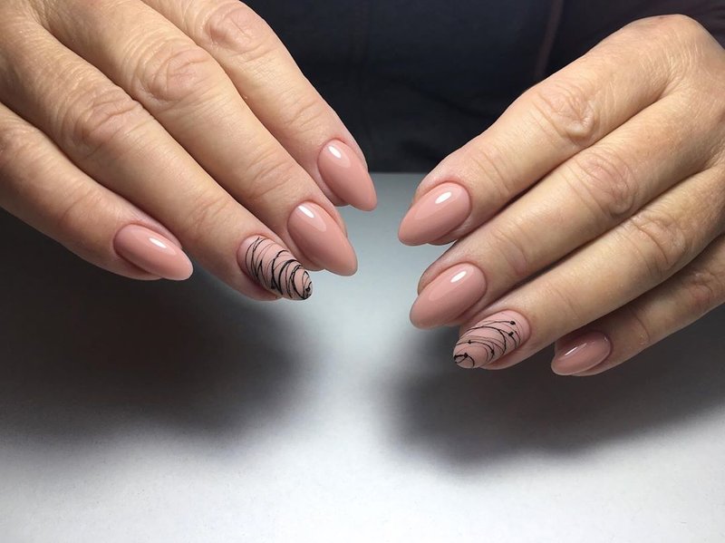 Nude manicure with spider web